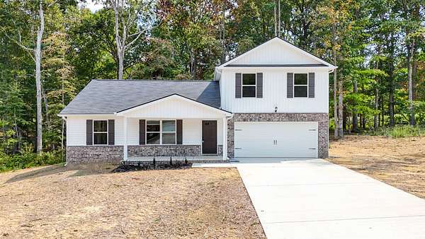 1.59 Acres of Residential Land with Home for Sale in Dickson, Tennessee