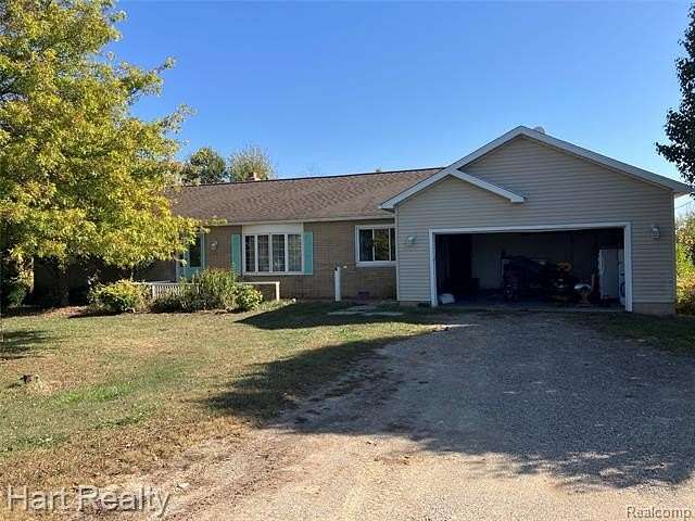 2 Acres of Land with Home for Sale in Moore Township, Michigan