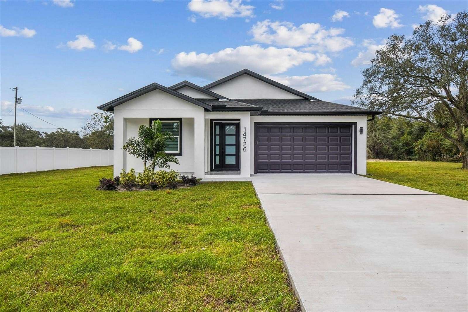 2.3 Acres of Residential Land with Home for Sale in Spring Hill, Florida