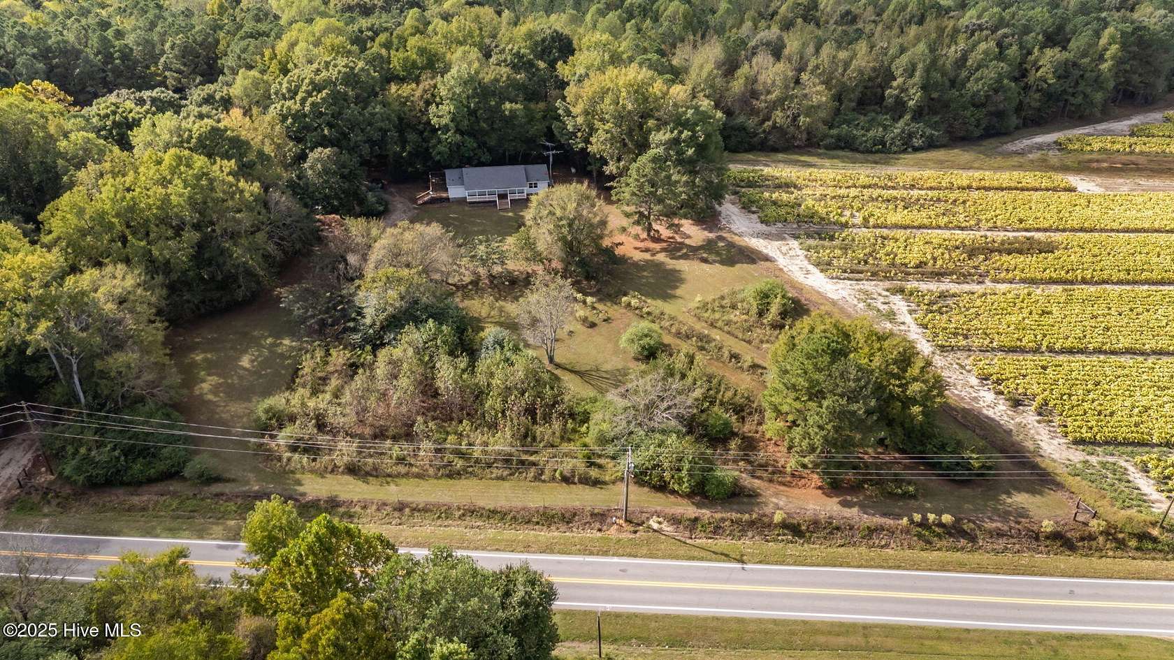 19.4 Acres of Land with Home for Sale in Whitakers, North Carolina