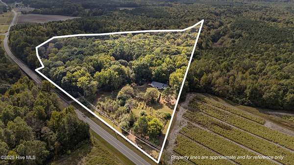 19.4 Acres of Land with Home for Sale in Whitakers, North Carolina