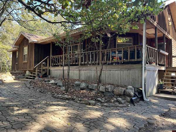 5.3 Acres of Residential Land with Home for Sale in Calico Rock, Arkansas