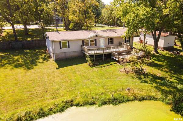 6.7 Acres of Residential Land with Home for Sale in Harrisburg, Illinois