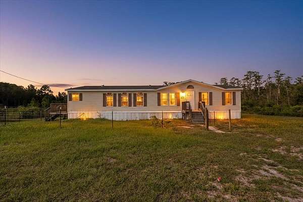 10.6 Acres of Land with Home for Sale in Trenton, Florida