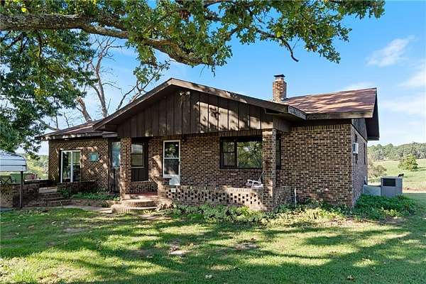 10 Acres of Land with Home for Sale in Berryville, Arkansas