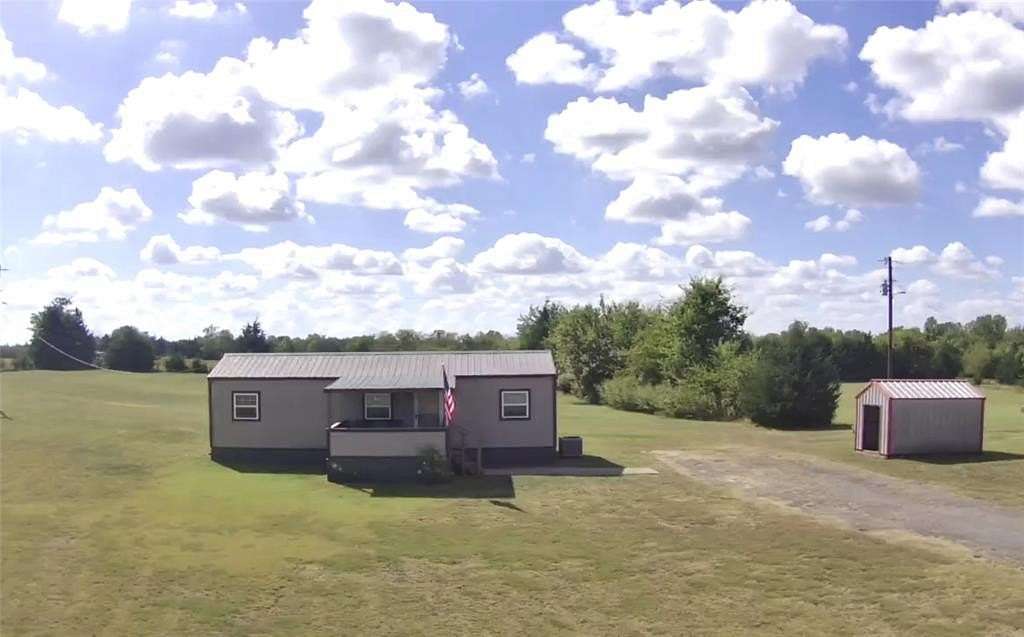 2.9 Acres of Residential Land with Home for Sale in Roxton, Texas