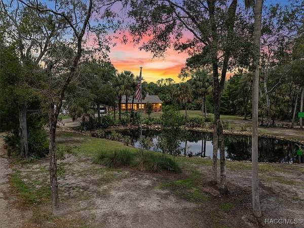 5.26 Acres of Residential Land with Home for Sale in Yankeetown, Florida