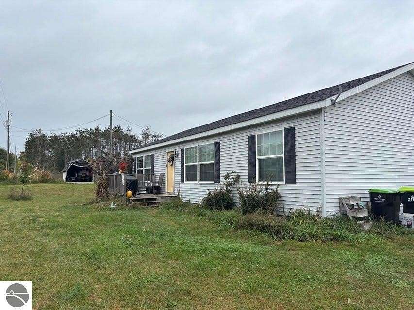 2.5 Acres of Residential Land with Home for Sale in Petoskey, Michigan