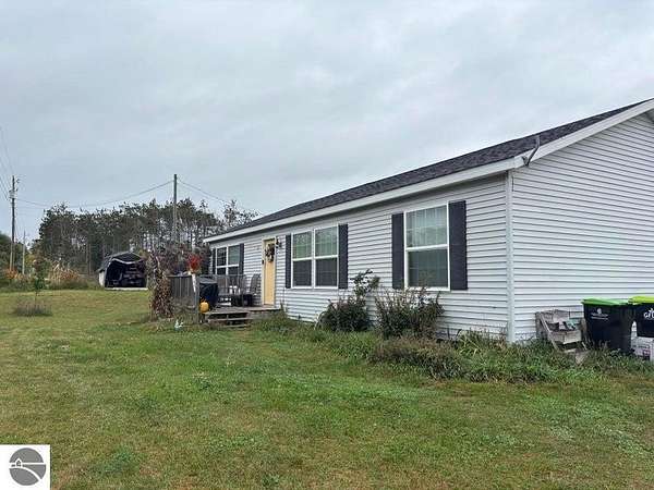 2.5 Acres of Residential Land with Home for Sale in Petoskey, Michigan