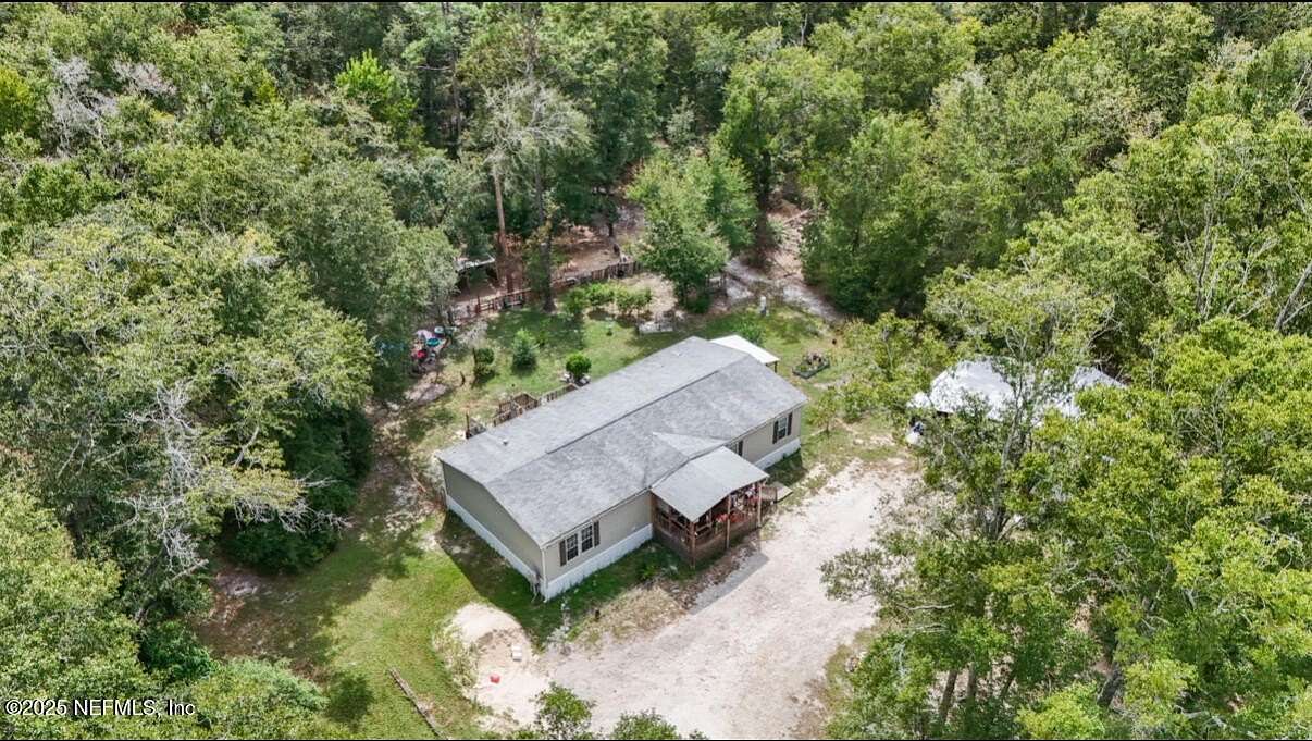 5 Acres of Residential Land with Home for Sale in Lake City, Florida