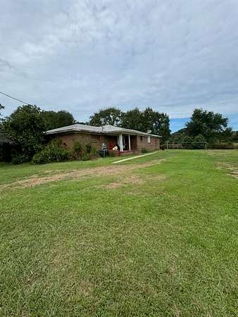 65.6 Acres of Agricultural Land with Home for Sale in Irvington, Alabama