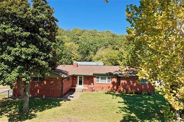 10.6 Acres of Land with Home for Sale in Checotah, Oklahoma