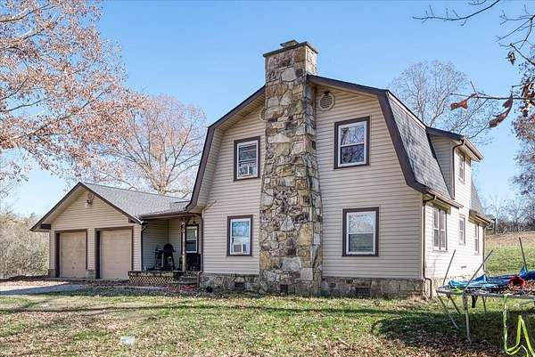 4.6 Acres of Residential Land with Home for Sale in Crossville, Tennessee