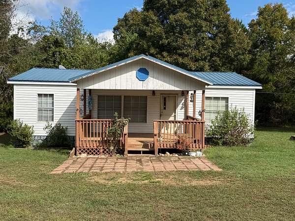 10 Acres of Land with Home for Sale in Leslie, Arkansas