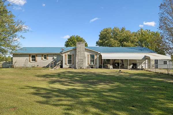 15.7 Acres of Land with Home for Sale in Smithville, Tennessee