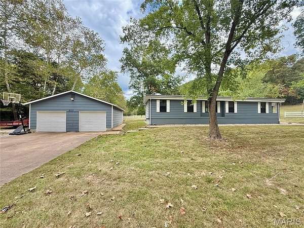 5 Acres of Residential Land with Home for Sale in Cedar Hill, Missouri