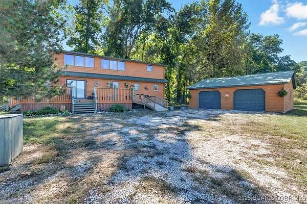 11.5 Acres of Recreational Land with Home for Sale in Roach, Missouri