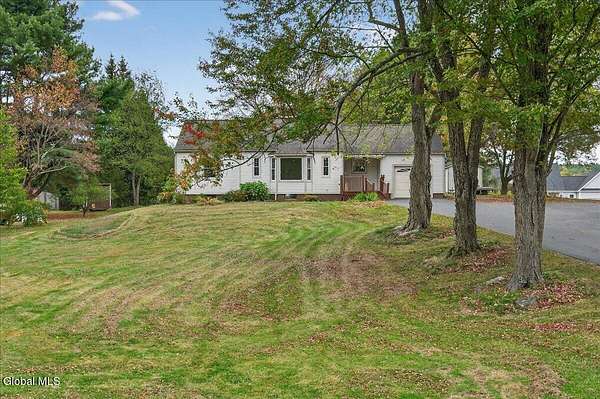 2 Acres of Residential Land with Home for Sale in West Sand Lake, New York