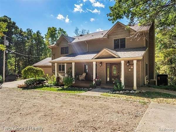 3.9 Acres of Residential Land with Home for Sale in Oxford, Michigan