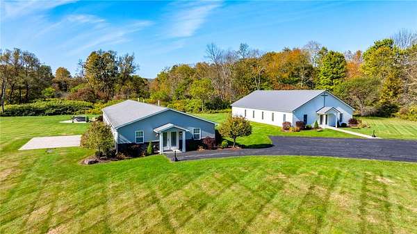 5.49 Acres of Improved Commercial Land for Sale in Morris, New York