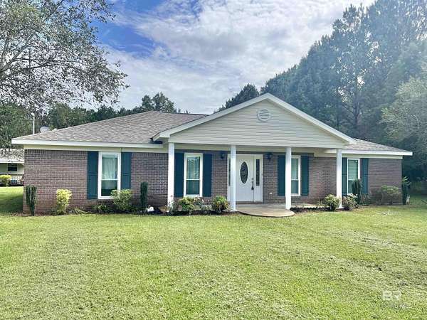 2 Acres of Residential Land with Home for Sale in Walnut Hill, Florida