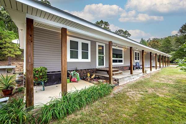 10 Acres of Residential Land with Home for Sale in Norman, Arkansas