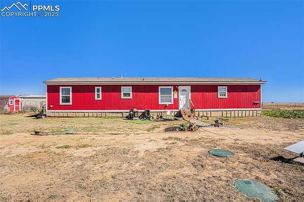 40 Acres of Agricultural Land with Home for Sale in Yoder, Colorado