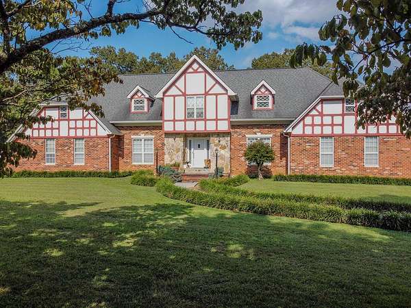 5 Acres of Residential Land with Home for Sale in Englewood, Tennessee