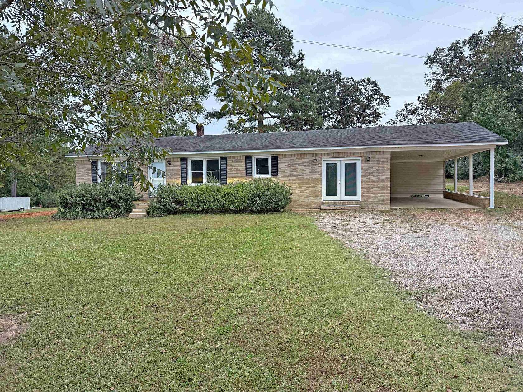 1.76 Acres of Residential Land with Home for Sale in Morris Chapel, Tennessee