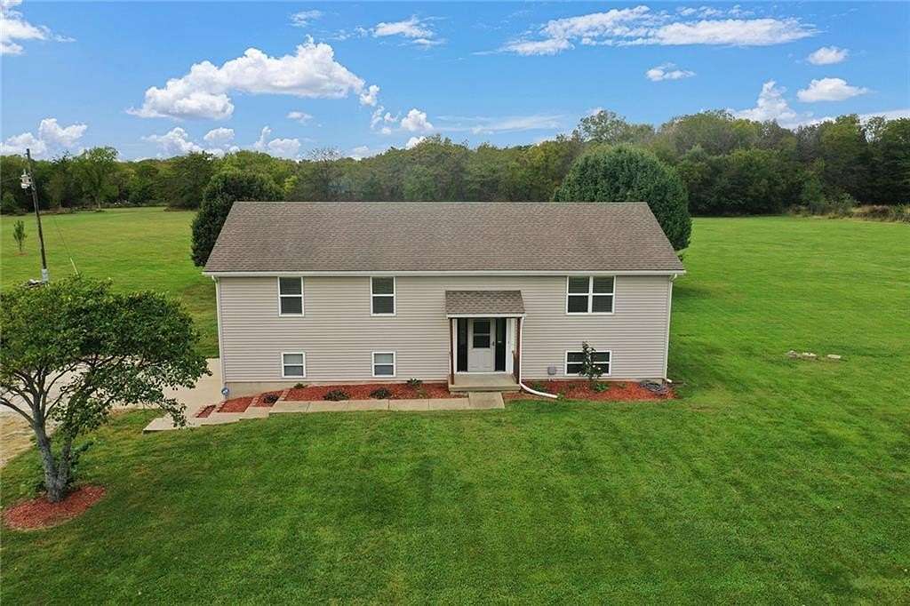 4.5 Acres of Residential Land with Home for Sale in Peculiar, Missouri