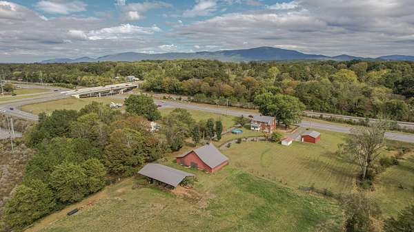 40.3 Acres of Agricultural Land with Home for Sale in Ocoee, Tennessee