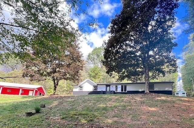 5.19 Acres of Residential Land with Home for Sale in New Philadelphia, Ohio