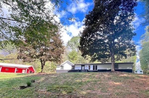 5.19 Acres of Residential Land with Home for Sale in New Philadelphia, Ohio