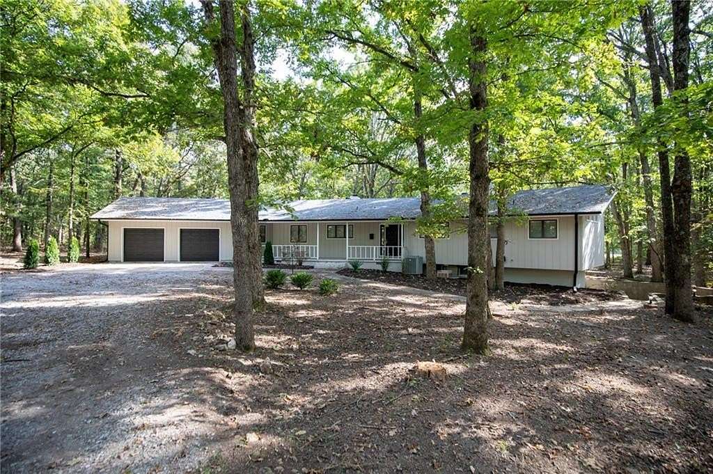 5.12 Acres of Residential Land with Home for Sale in Gravette, Arkansas