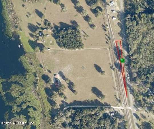 0.35 Acres of Commercial Land for Sale in Seville, Florida