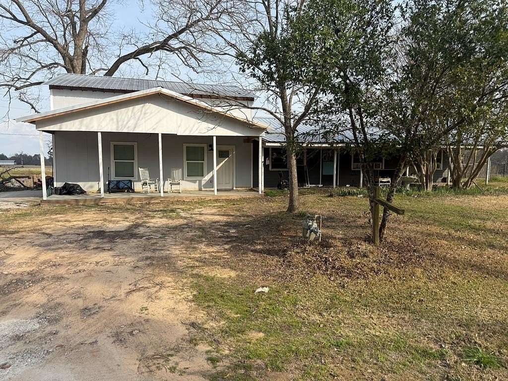 3 Acres of Residential Land with Home for Sale in Garrison, Texas