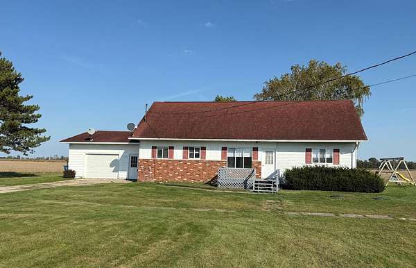 1.5 Acres of Residential Land with Home for Sale in Linwood, Michigan