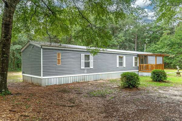 2.44 Acres of Residential Land with Home for Sale in Baker, Florida