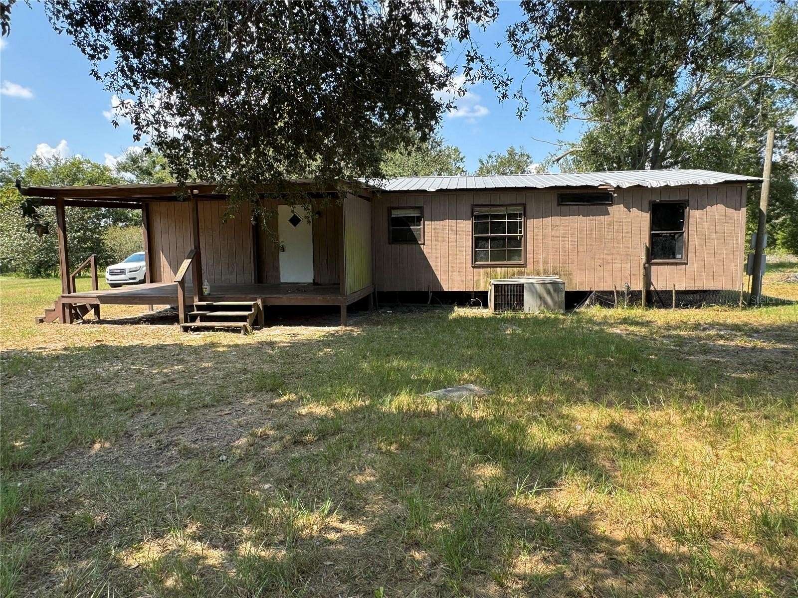 5 Acres of Land with Home for Sale in Live Oak, Florida