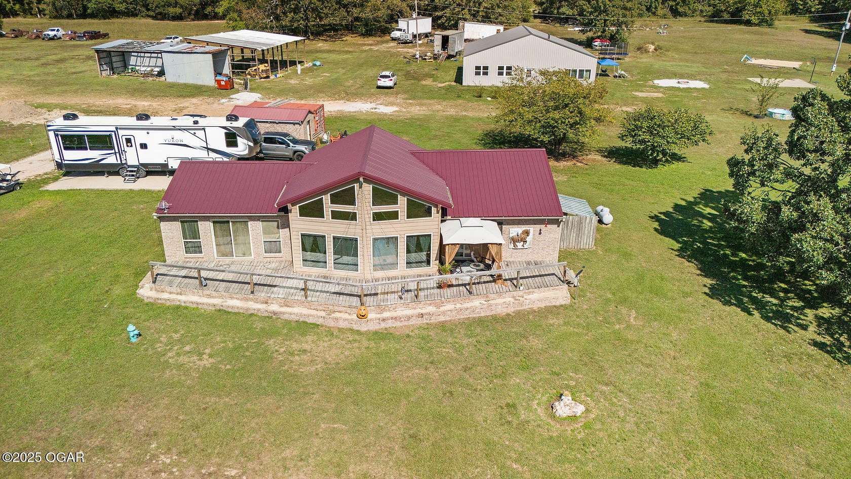 10 Acres of Residential Land with Home for Sale in Anderson, Missouri