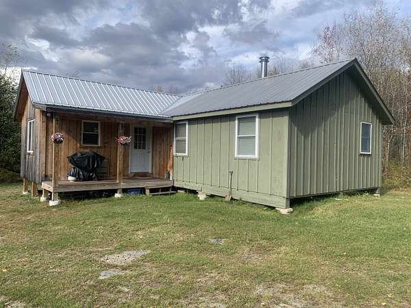 13.8 Acres of Recreational Land with Home for Sale in Clarksville Town, New Hampshire