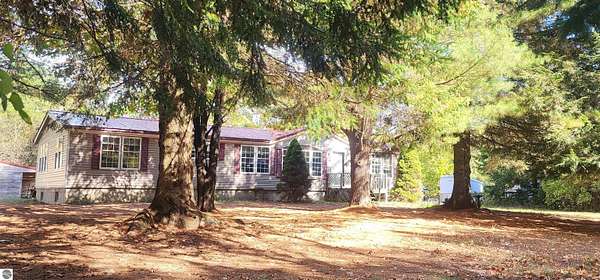 5 Acres of Residential Land with Home for Sale in Luther, Michigan