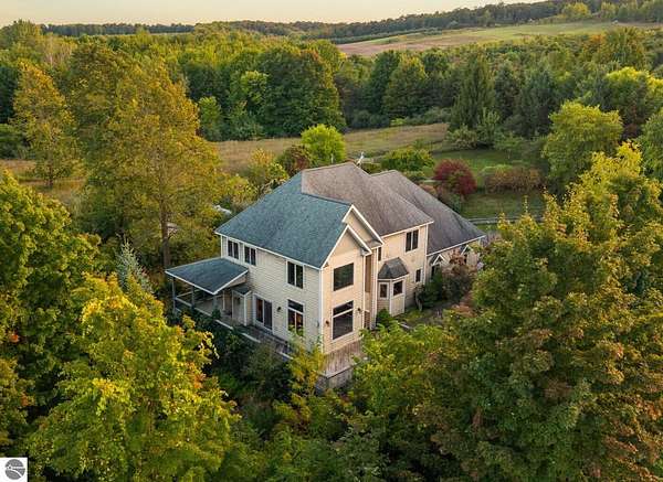 7.25 Acres of Residential Land with Home for Sale in Traverse City, Michigan