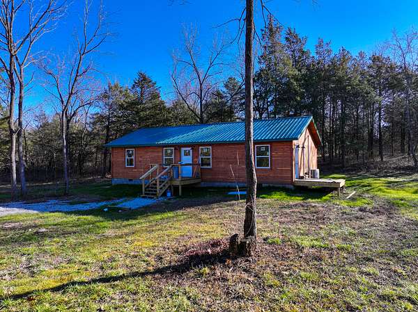 3 Acres of Residential Land with Home for Sale in Collins, Missouri