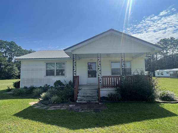 4 Acres of Residential Land with Home for Lease in Baker, Florida