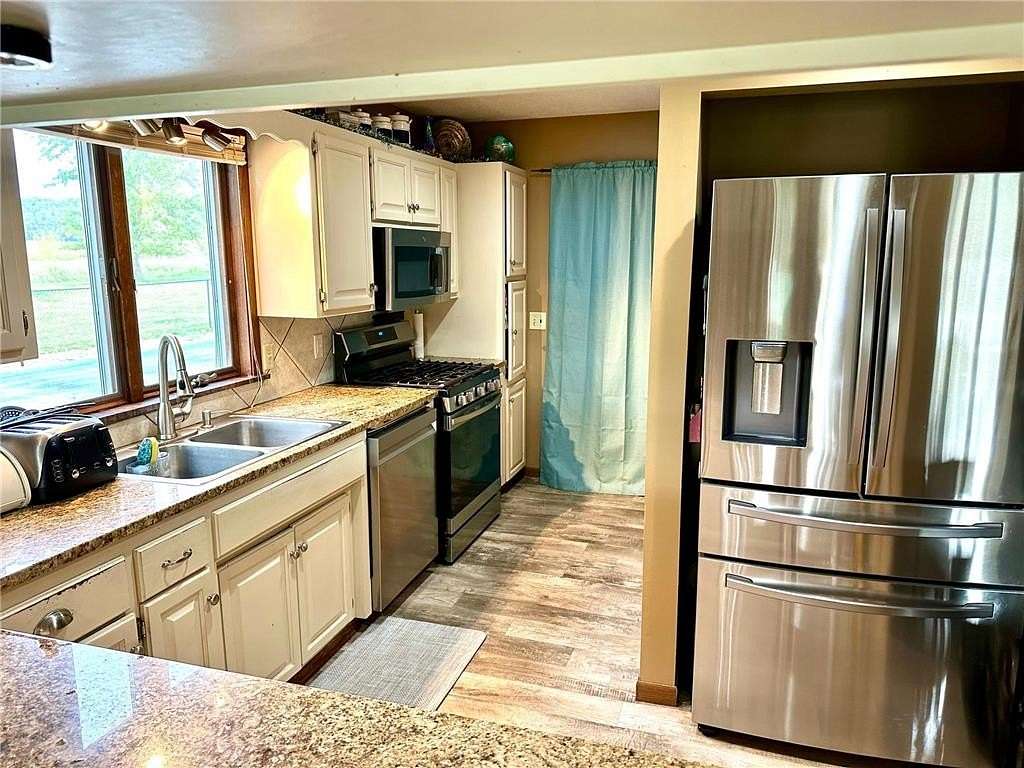 5 Acres of Land with Home for Sale in River Falls, Wisconsin