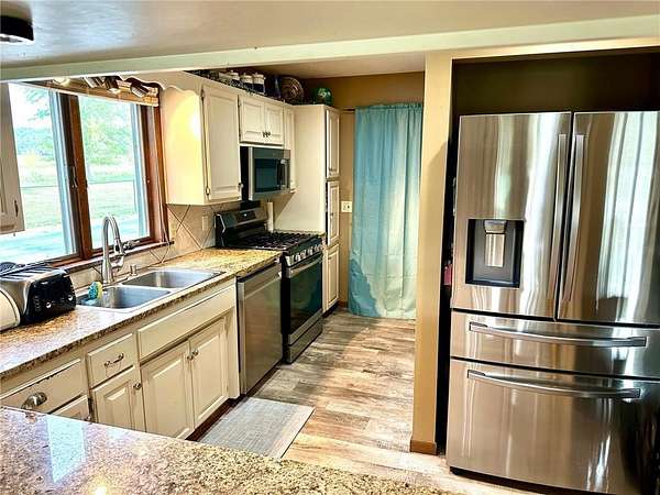 5 Acres of Residential Land with Home for Sale in River Falls, Wisconsin