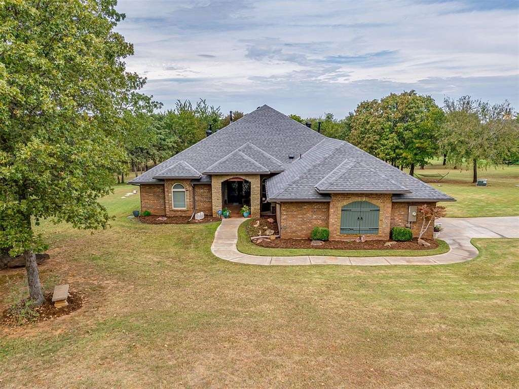 8.7 Acres of Residential Land with Home for Sale in Jones, Oklahoma