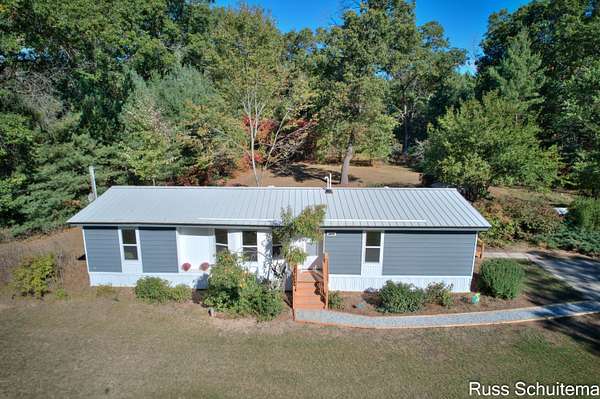 9.75 Acres of Residential Land with Home for Sale in Holton, Michigan