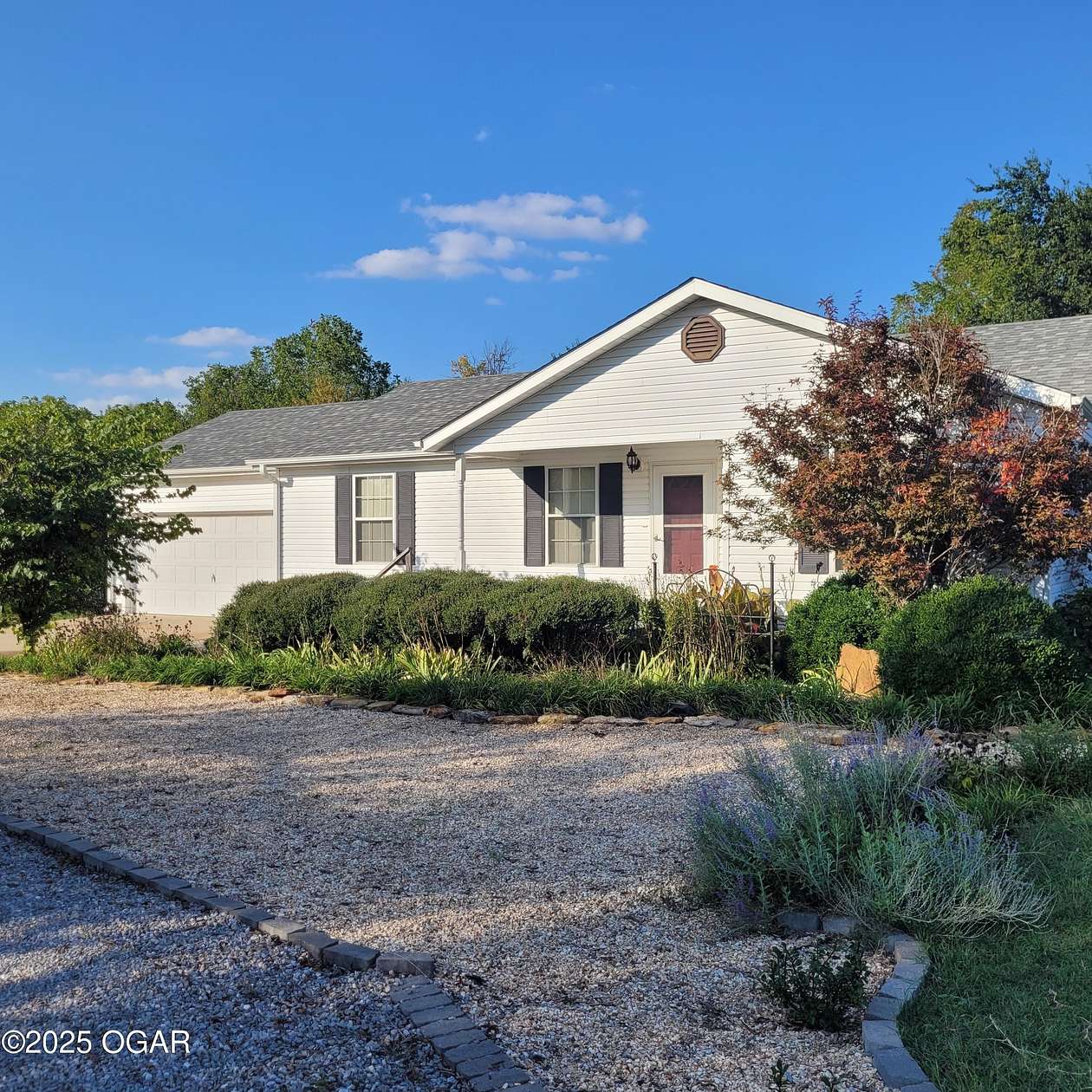 0.8 Acres of Residential Land with Home for Sale in Webb City, Missouri